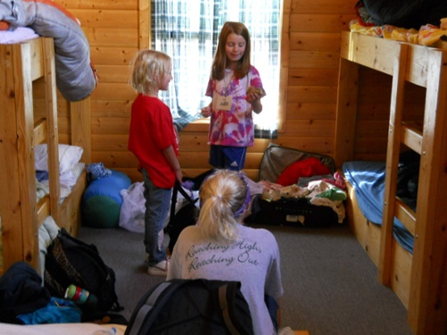 camp granite lake sleep away summer camp children unpacking bags getting ready for sleep away / residential summer camp