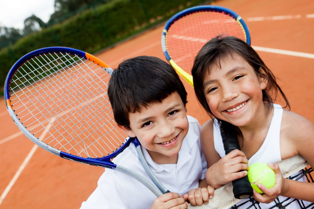 kids playing tennis as a sports option for home schooled kids