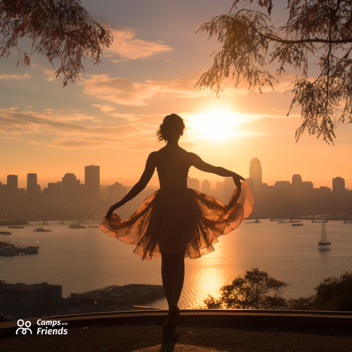 ballerina looking out onto a city at sunset-1