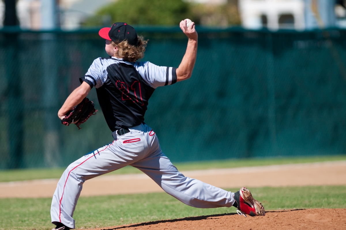 difference between softball and baseball in blog photo of pitcher