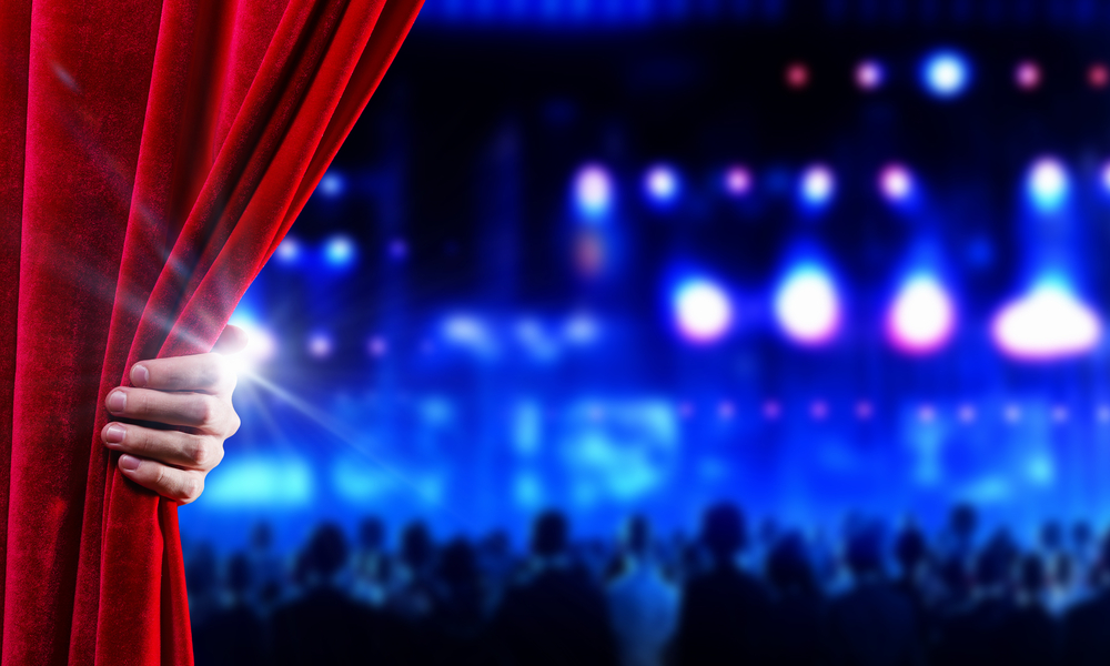 theatre cover photo with red curtain