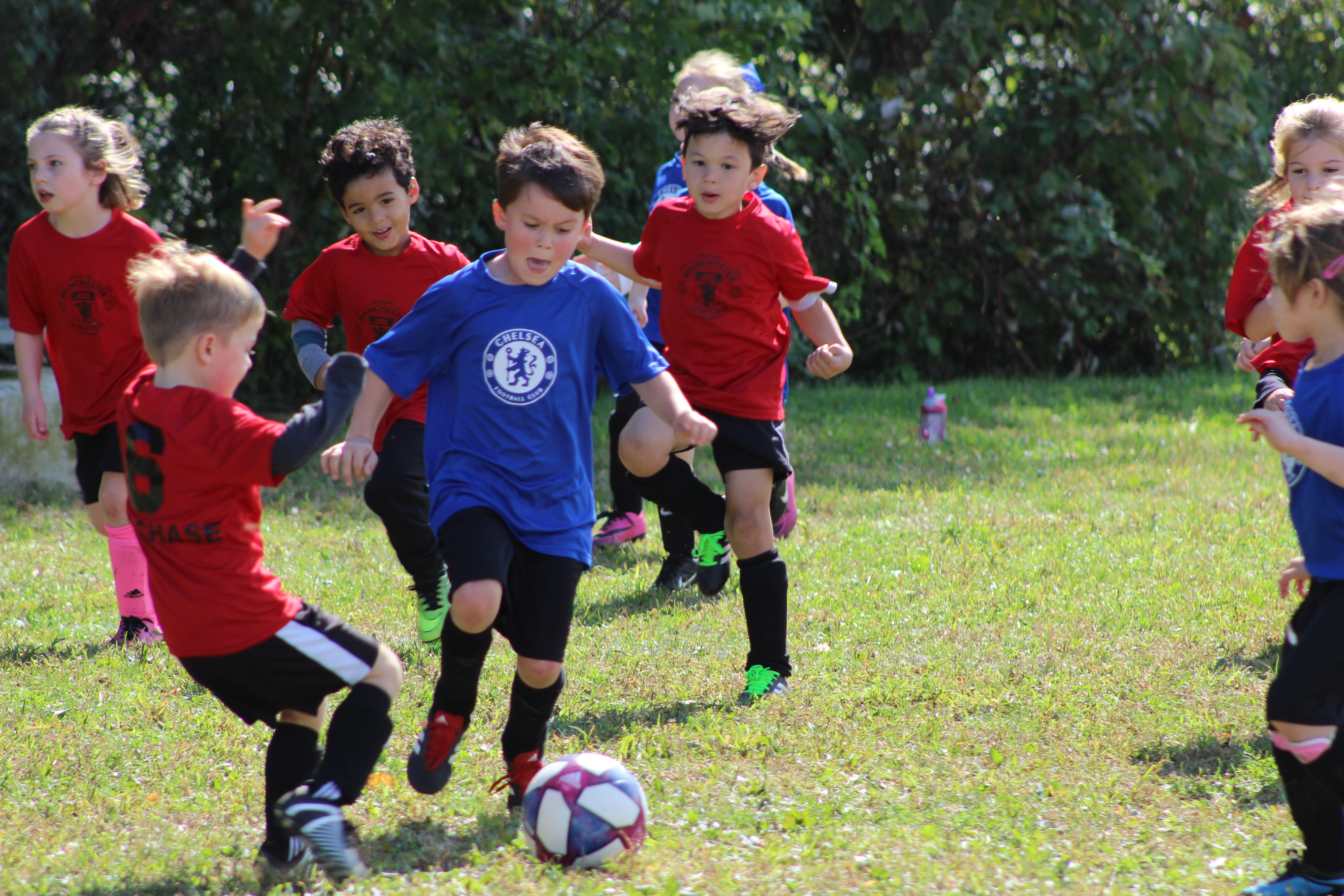 kids playing soccer preventing abuse in youth sports